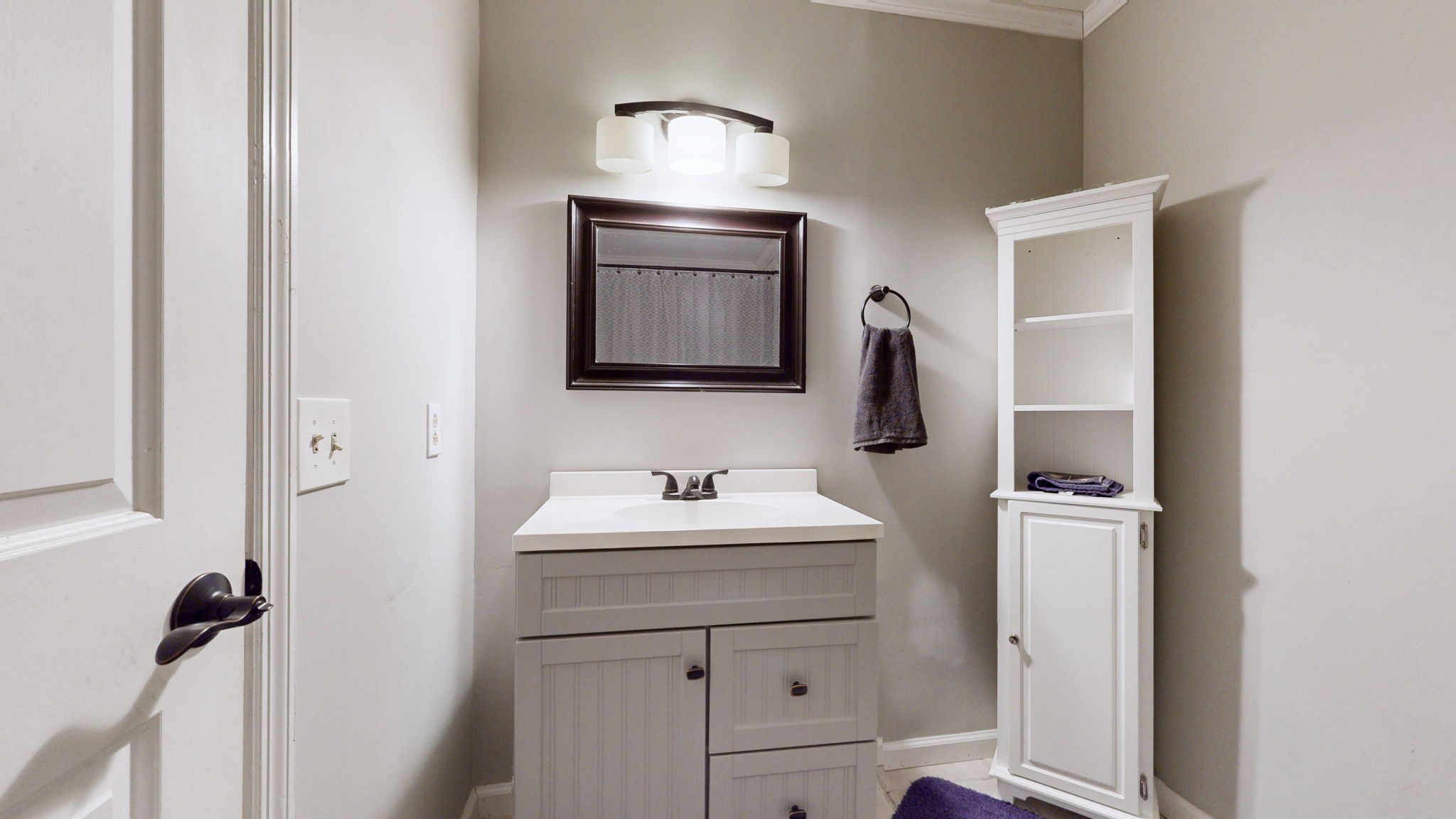 633 Buck Lane Murfreesboro, TN 37129 - Photo 10 of 16 a bathroom with a sink a toilet and mirror