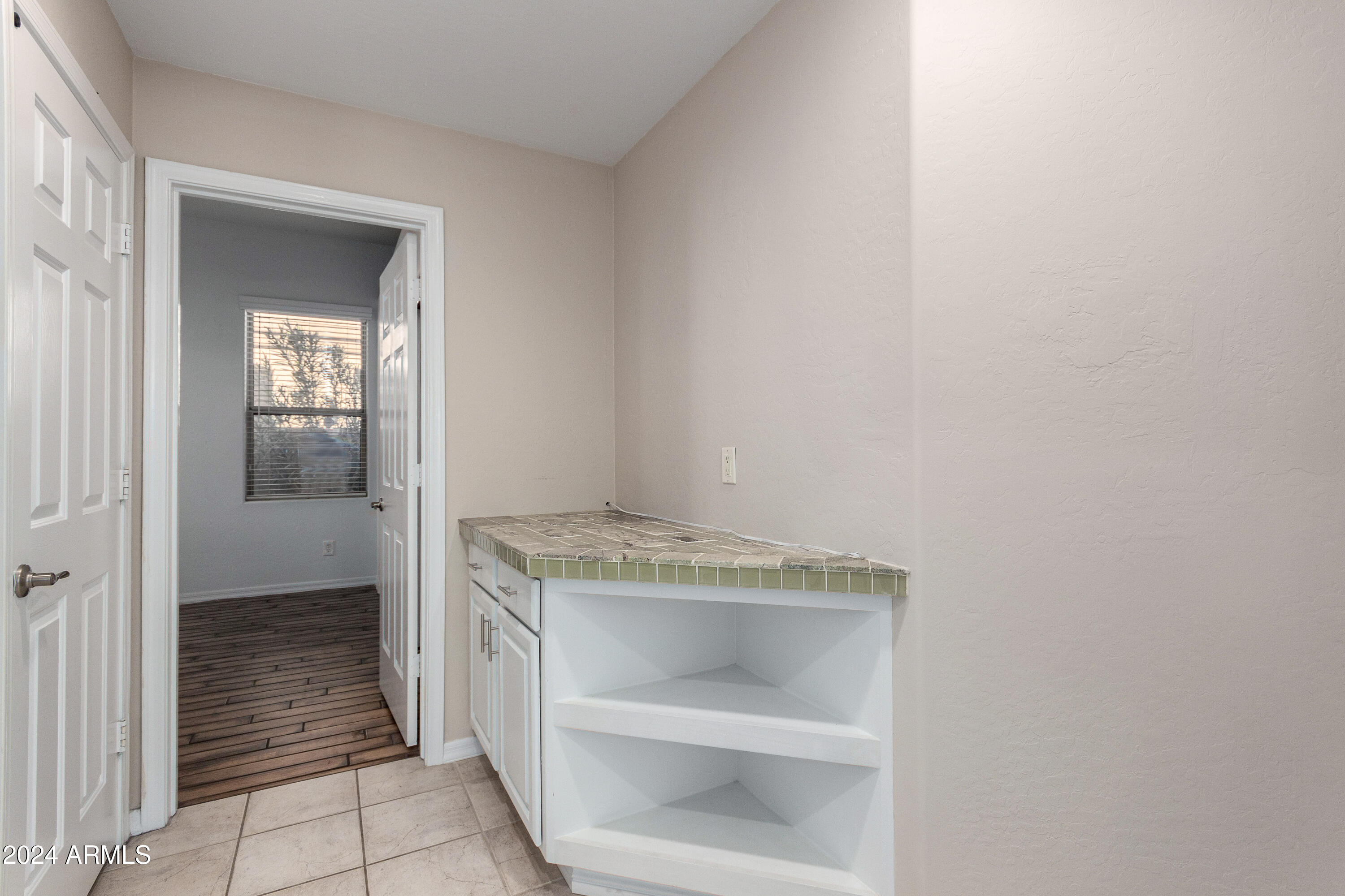 5246 East Estevan Road Phoenix, AZ 85054 - Photo 24 of 40 Storage cabinet outside Bedroom 2