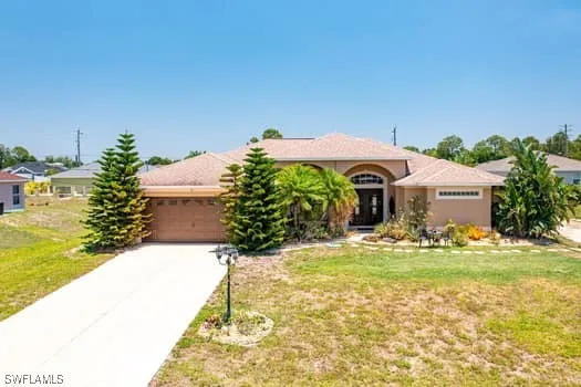 a swimming pool with outdoor seating and yard