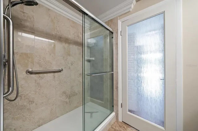 a view of swimming pool with outdoor seating and plants