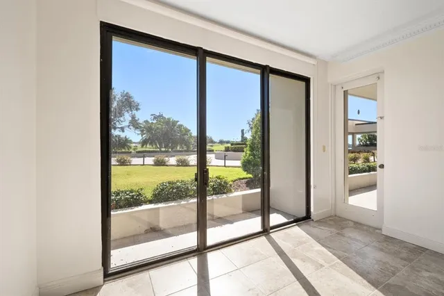 a view of a swimming pool with lounge chairs
