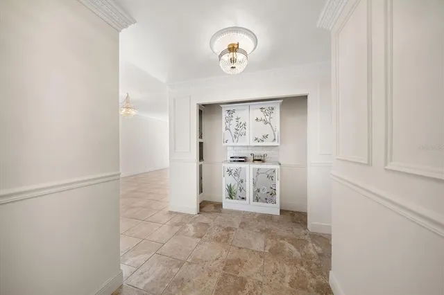 an aerial view of a house with a garden