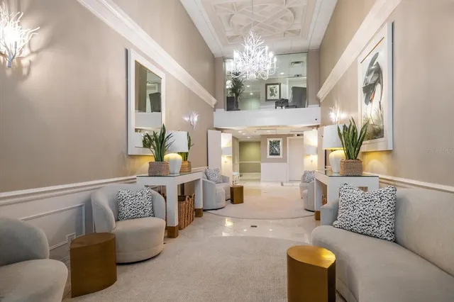 a front view of a building with a garden