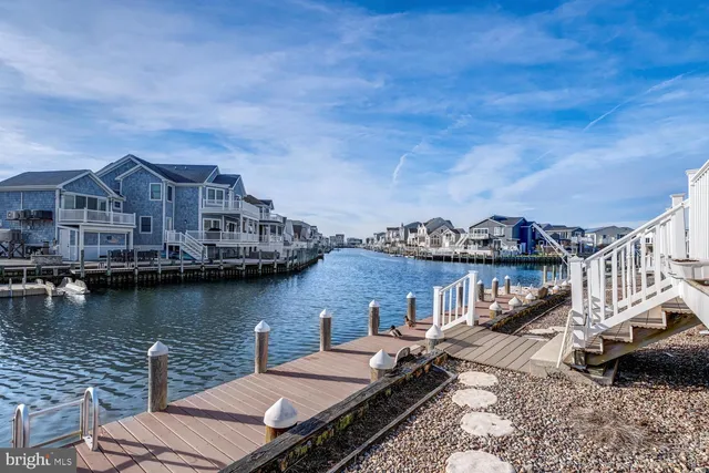 an aerial view of a house with a lake view