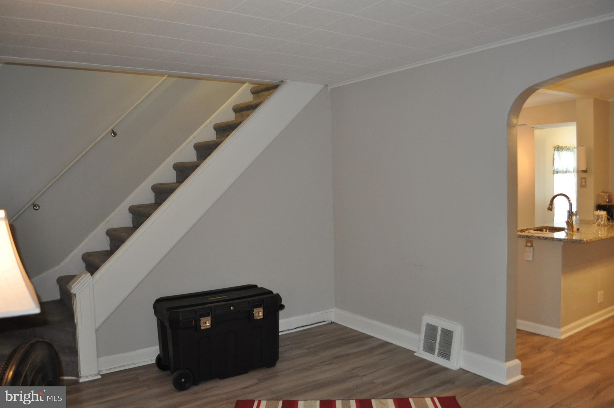 26 Kinship Road Baltimore, MD 21222 - Photo 12 of 24 Living room with view of Kitchen