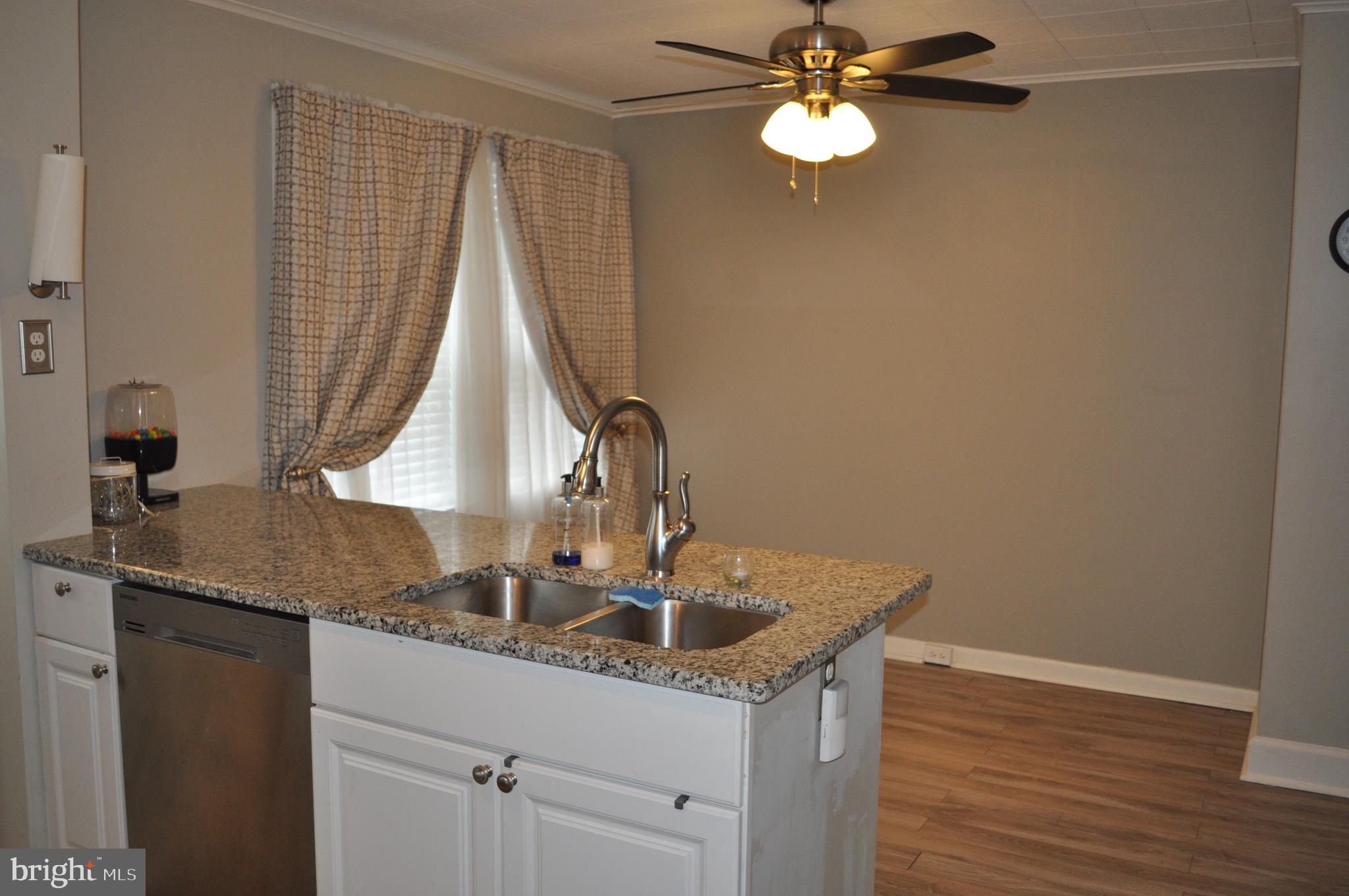 26 Kinship Road Baltimore, MD 21222 - Photo 15 of 24 Kitchen Island with double sink and dish washer