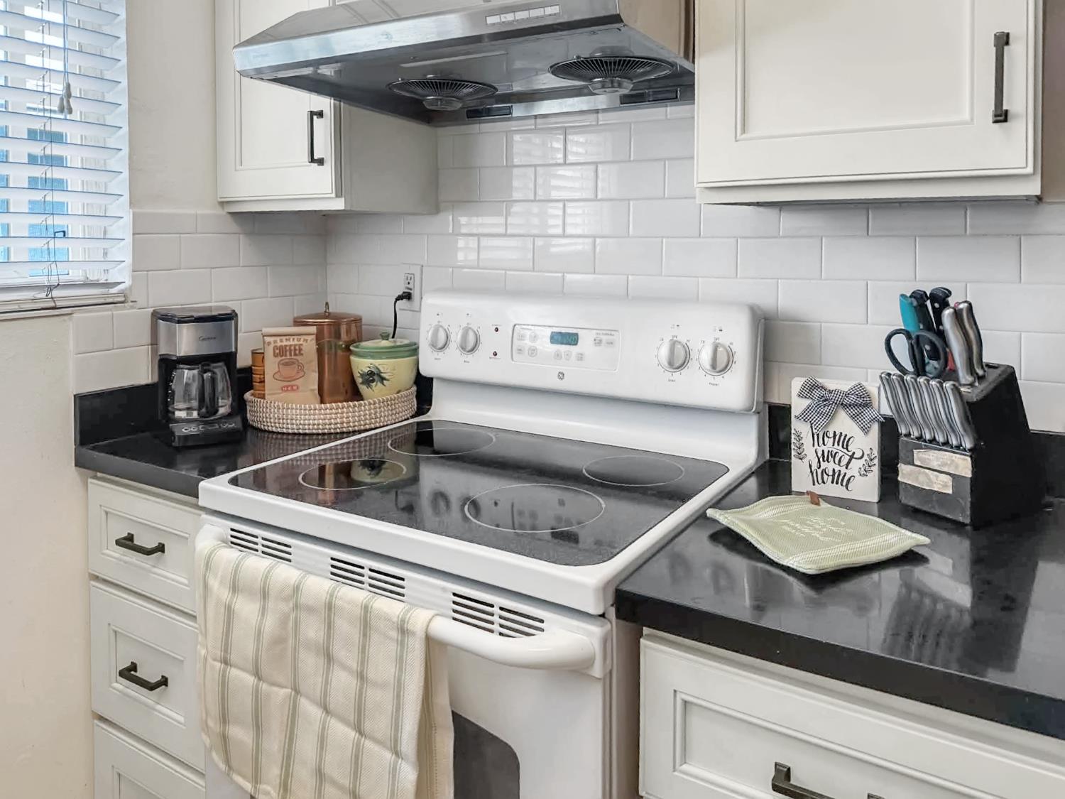 1369 Del Rio Circle, Unit D Concord, CA 94518 - Photo 12 of 21 a kitchen with a stove and cabinets