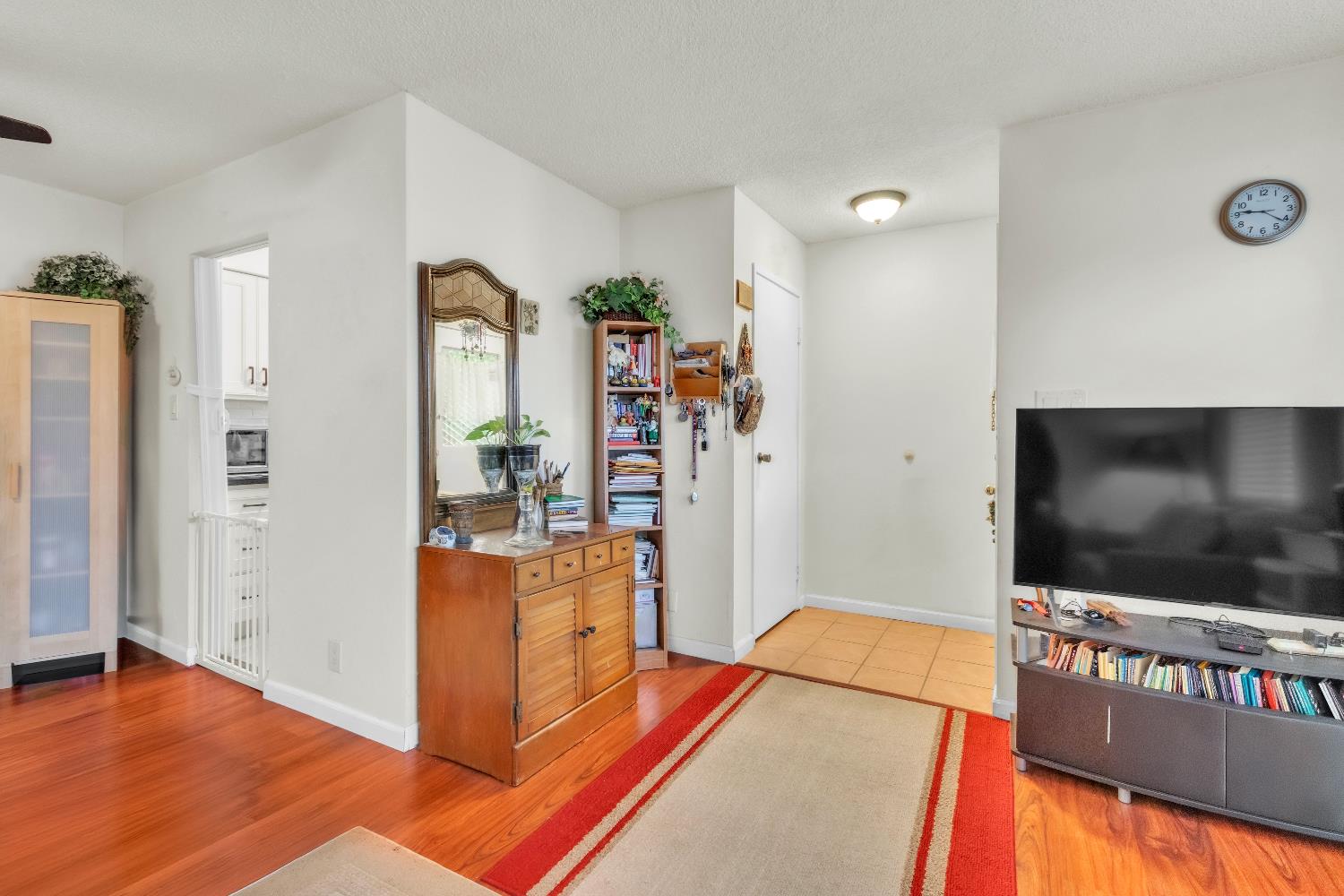 1369 Del Rio Circle, Unit D Concord, CA 94518 - Photo 7 of 21 a living room with furniture and a flat screen tv