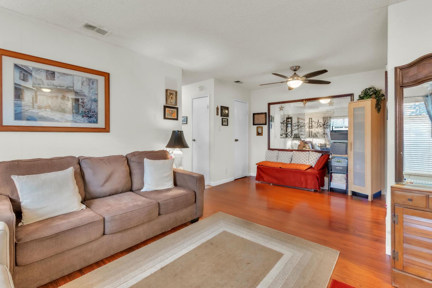 1369 Del Rio Circle, Unit D Concord, CA 94518 - Photo 9 of 21 a living room with furniture and a large window
