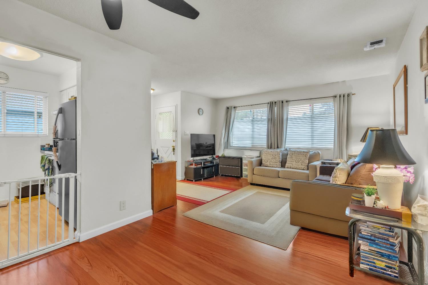 1369 Del Rio Circle, Unit D Concord, CA 94518 - Photo 10 of 21 a living room with furniture and a wooden floor