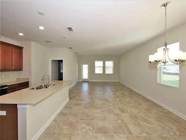 a lobby with furniture and window