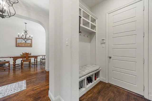 a view of kitchen and dining room with wooden floor