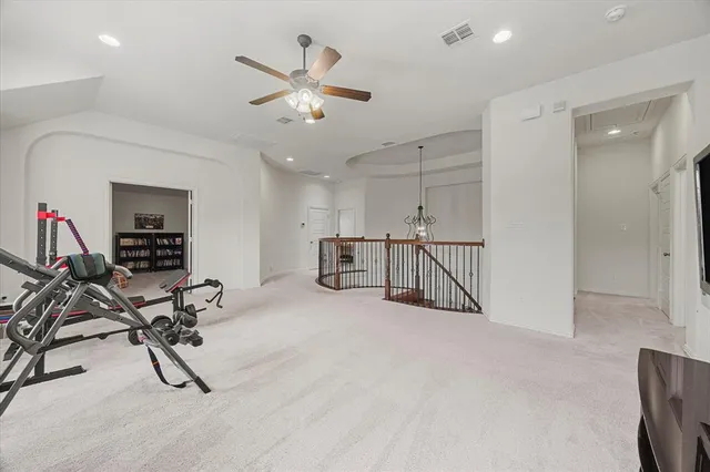 a view of a livingroom with furniture and a chandelier