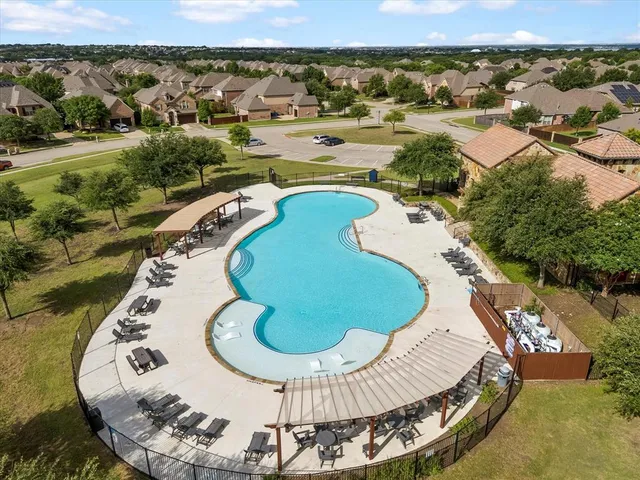 an aerial view of a swimming pool