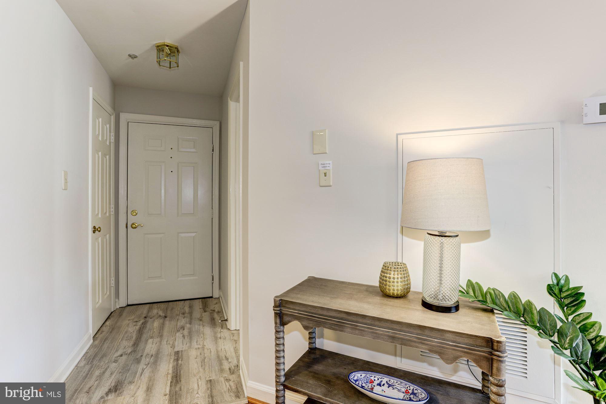 6832 Hayley Ridge Way, Unit O Baltimore, MD 21209 - Photo 7 of 28 Foyer