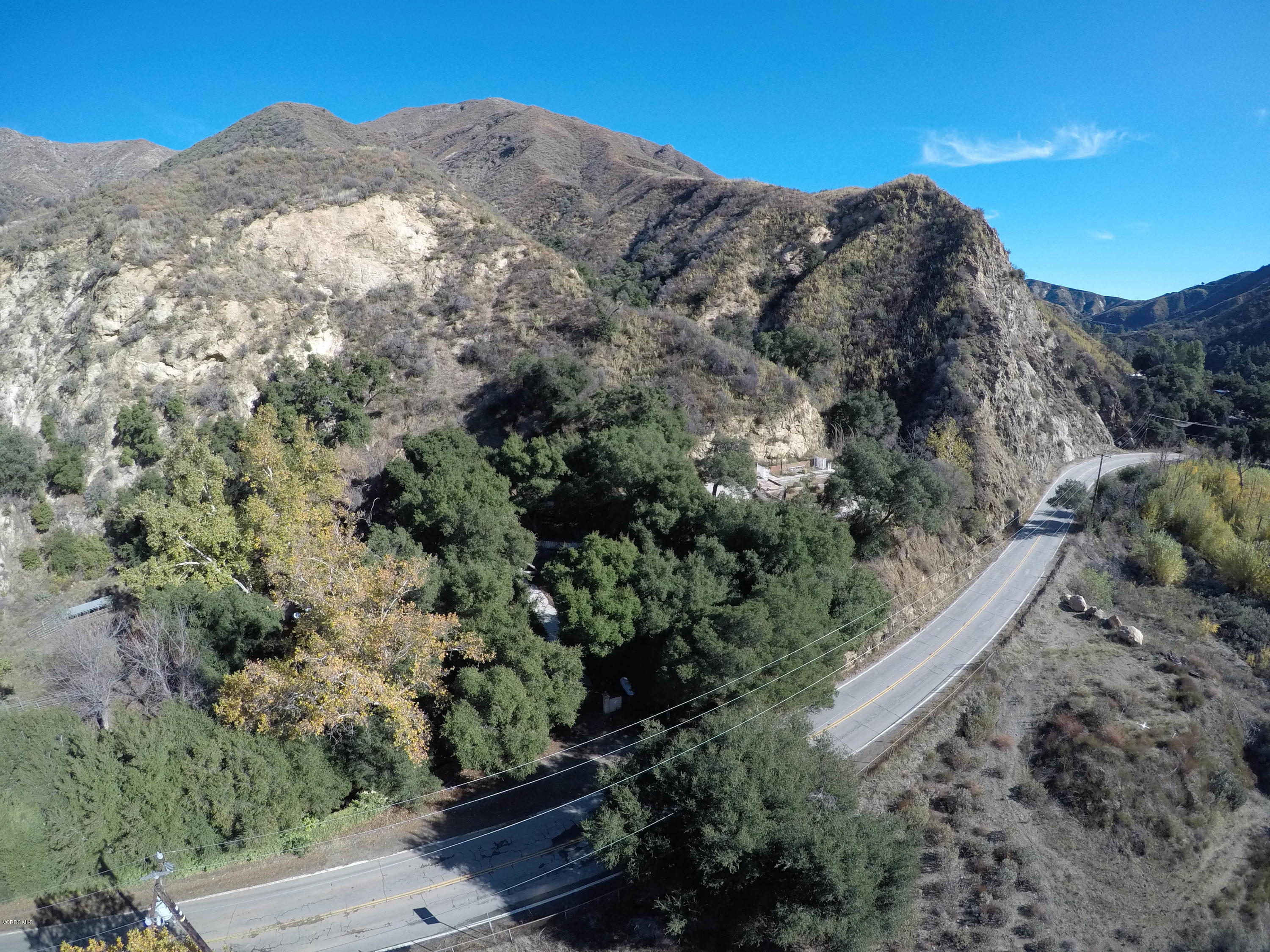 18452 Little Tujunga Canyon Road Canyon Country, CA 91387 - Photo 2 of 61 a view of a large building with mountains in the background