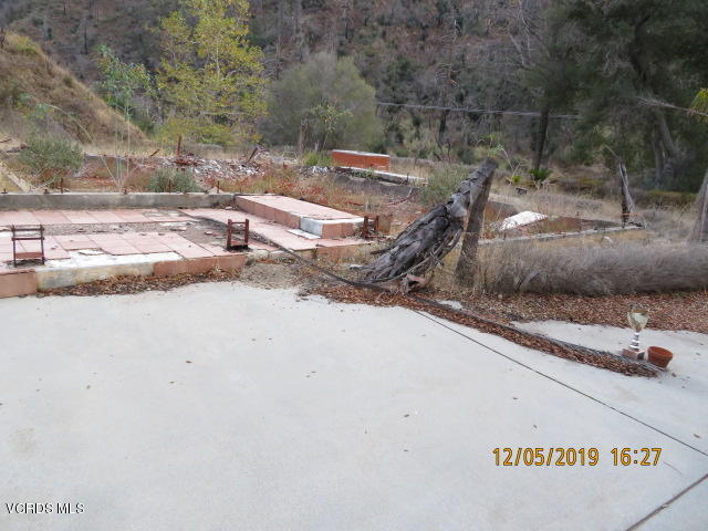 18452 Little Tujunga Canyon Road Canyon Country, CA 91387 - Photo 29 of 61 a view of a parking space with wooden fence