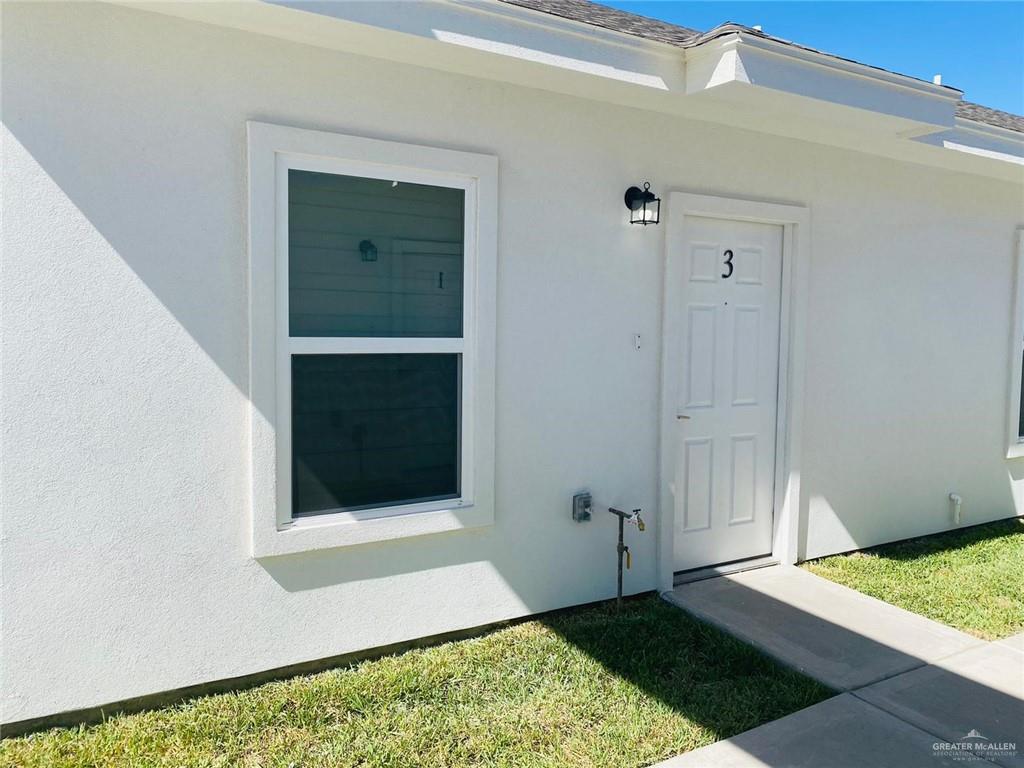 2202 South Sports Drive, Unit 1 Pharr, TX 78577 - Photo 3 of 12 Property entrance with stucco siding
