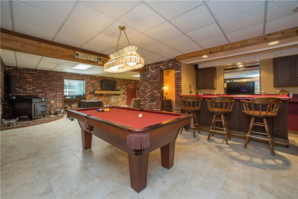 280 Linden Road Canonsburg, PA 15317 - Photo 17 of 25 Huge basement w/ wet bar, half bath, wood stove, storage and entertaining space