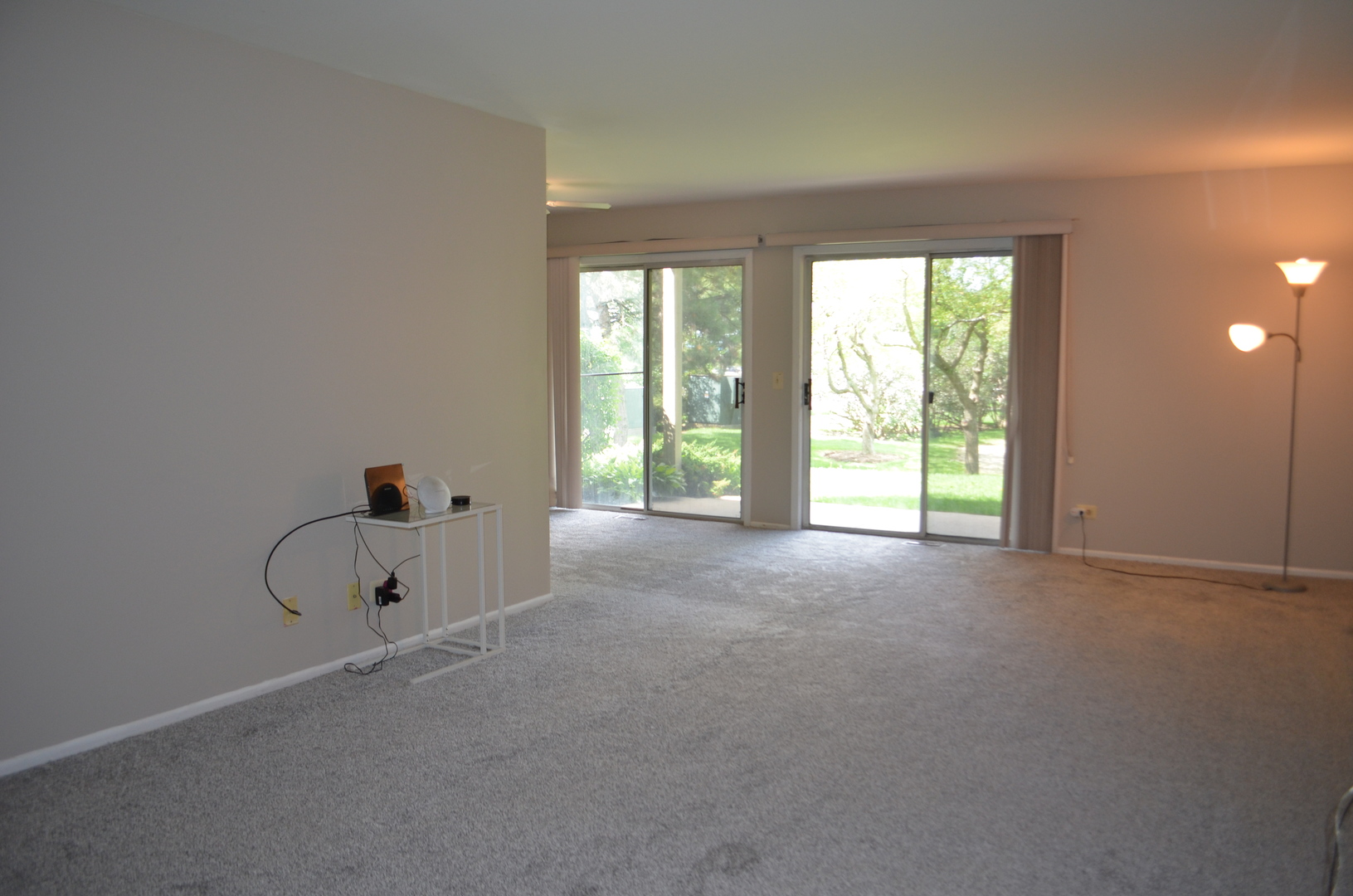 2 Aberdeen Court, Unit W1 Schaumburg, IL 60107 - Photo 2 of 31 a view of an empty room with a window