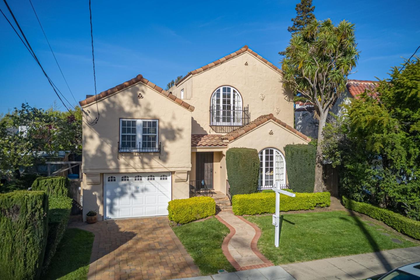 132 Dwight Road Burlingame, CA 94010 - Photo 2 of 69 a front view of a house with garden
