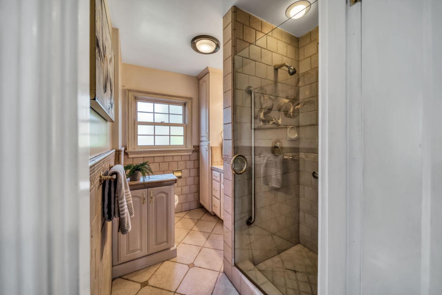 132 Dwight Road Burlingame, CA 94010 - Photo 22 of 69 a bathroom with a shower