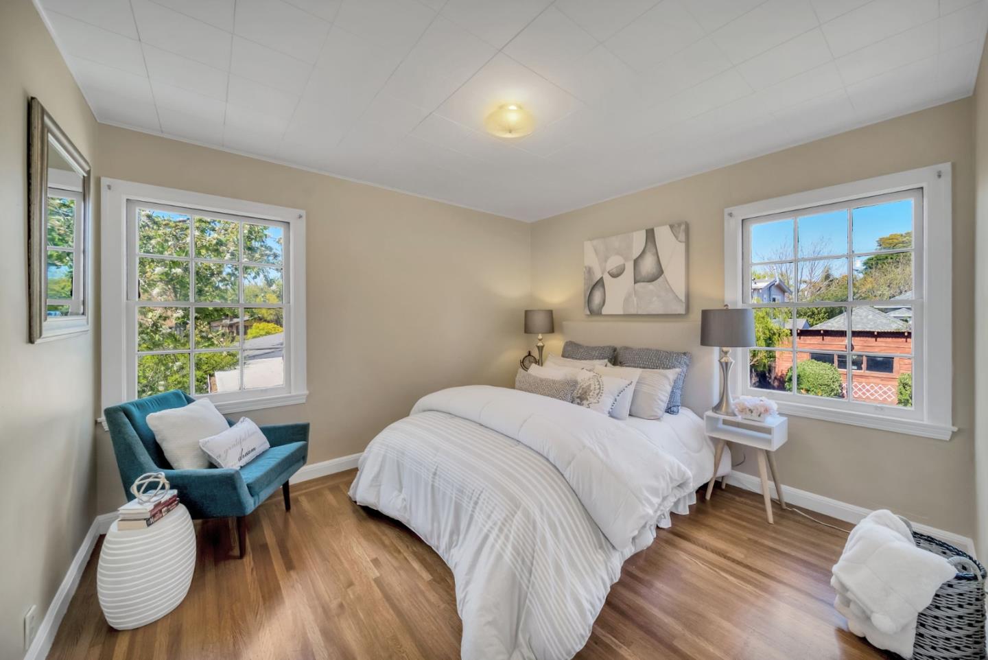 132 Dwight Road Burlingame, CA 94010 - Photo 23 of 69 a bedroom with a bed and wooden floor