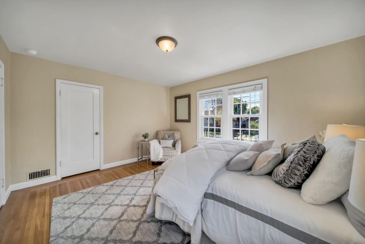 132 Dwight Road Burlingame, CA 94010 - Photo 28 of 69 a bedroom with a bed and a window