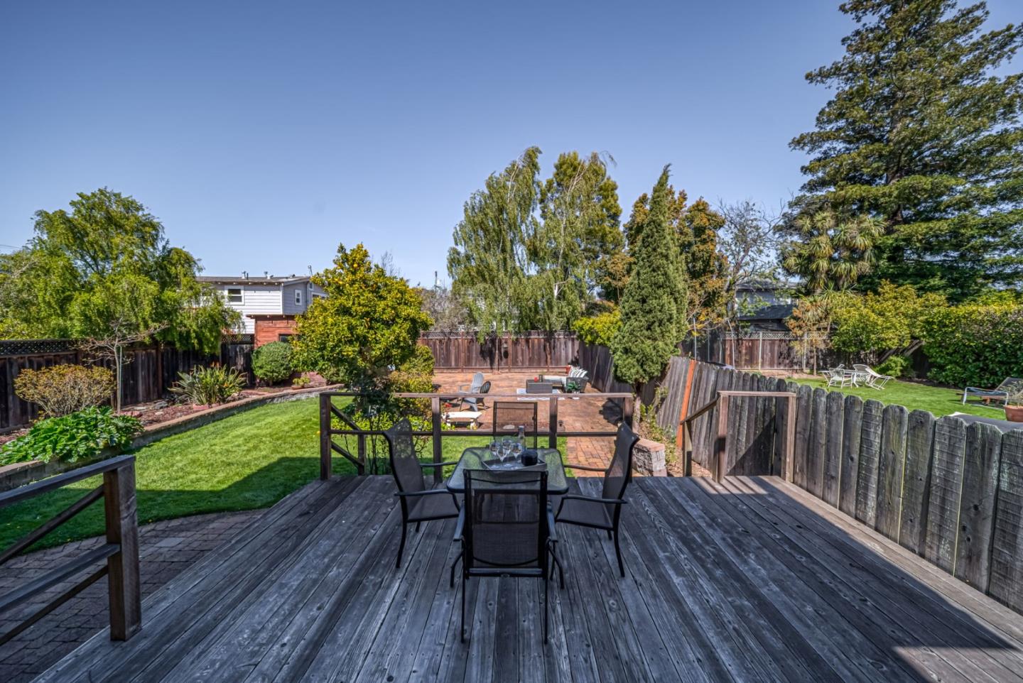 132 Dwight Road Burlingame, CA 94010 - Photo 47 of 69 a view of a chairs and table on the wooden floor