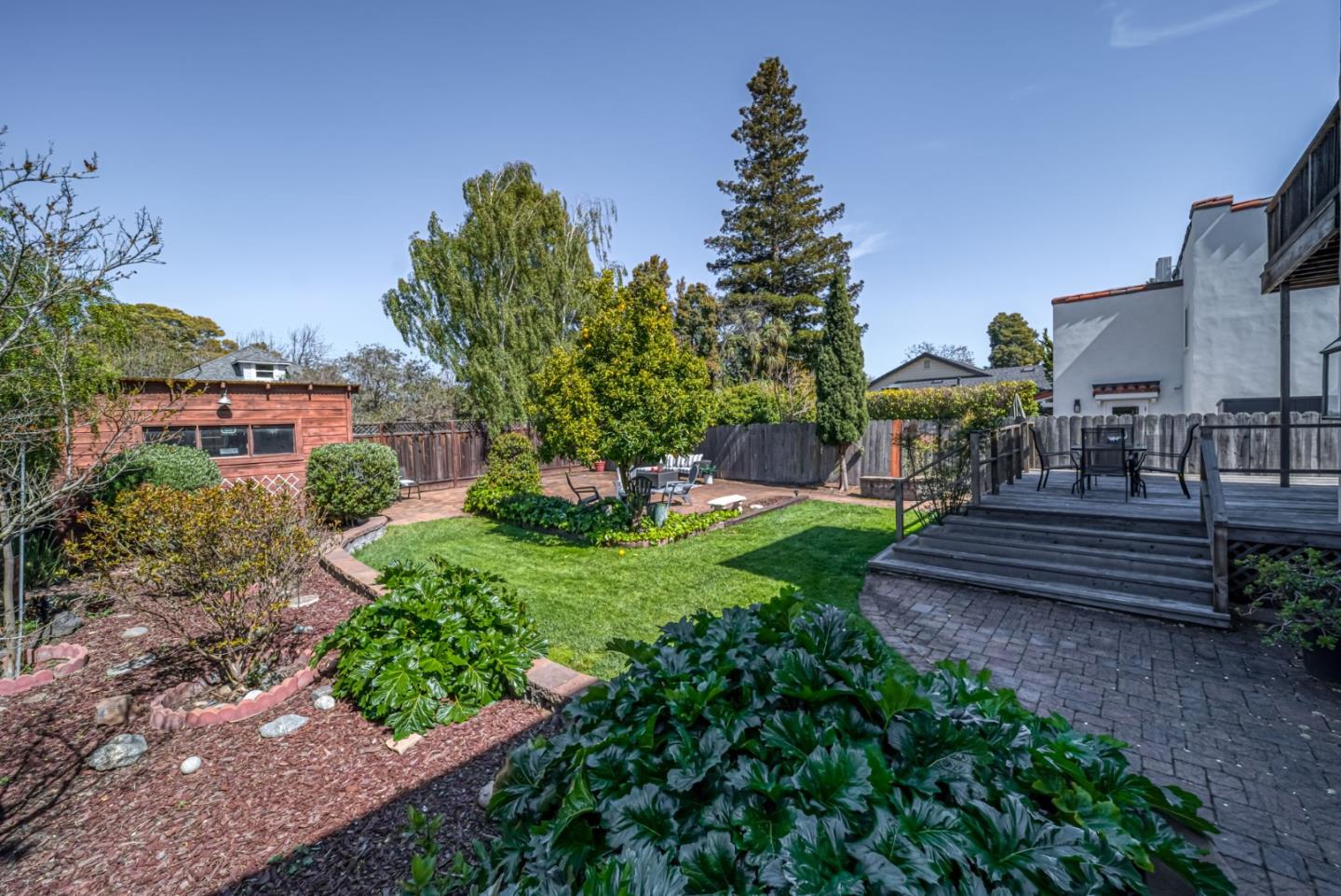 132 Dwight Road Burlingame, CA 94010 - Photo 50 of 69 a view of a bench in a garden