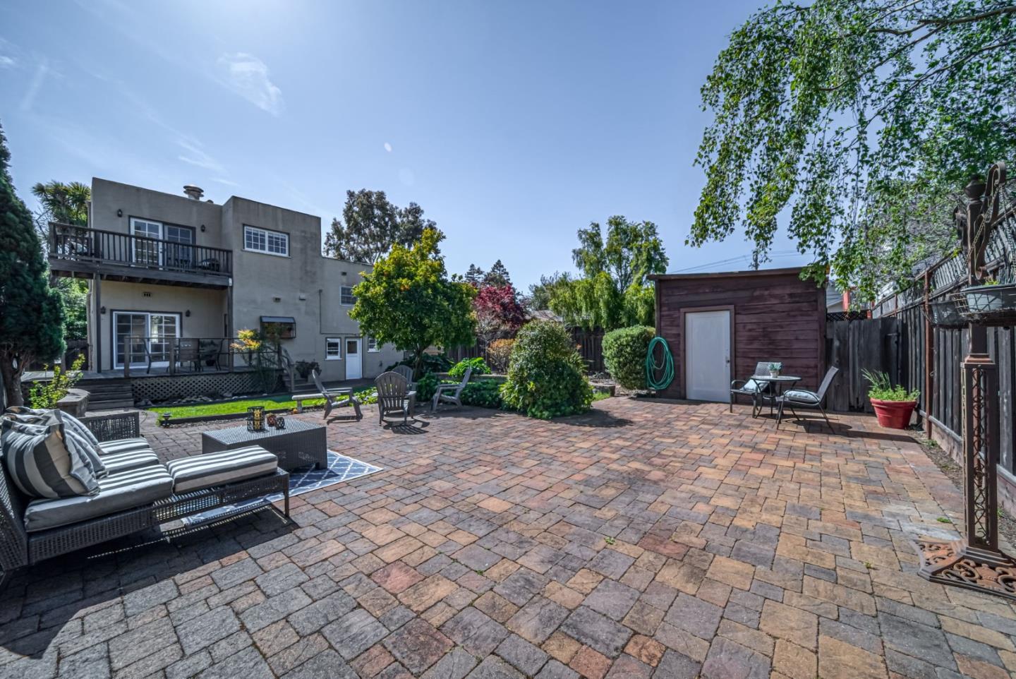 132 Dwight Road Burlingame, CA 94010 - Photo 54 of 69 a view of a yard with furniture and a fire pit
