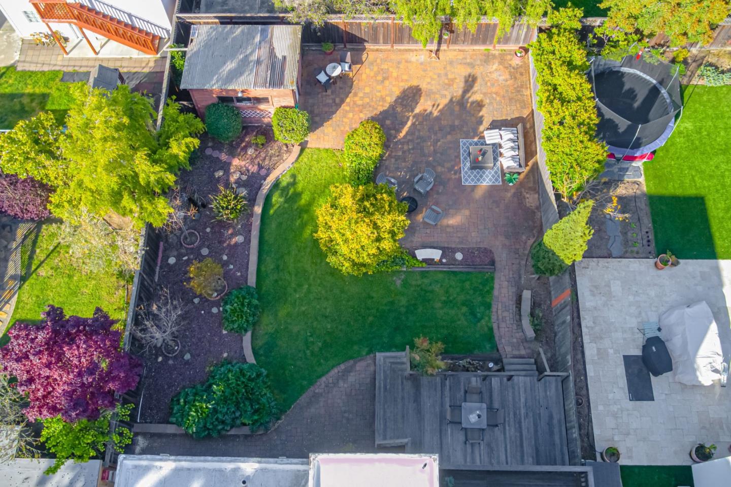 132 Dwight Road Burlingame, CA 94010 - Photo 64 of 69 an aerial view of a house with a garden and a yard
