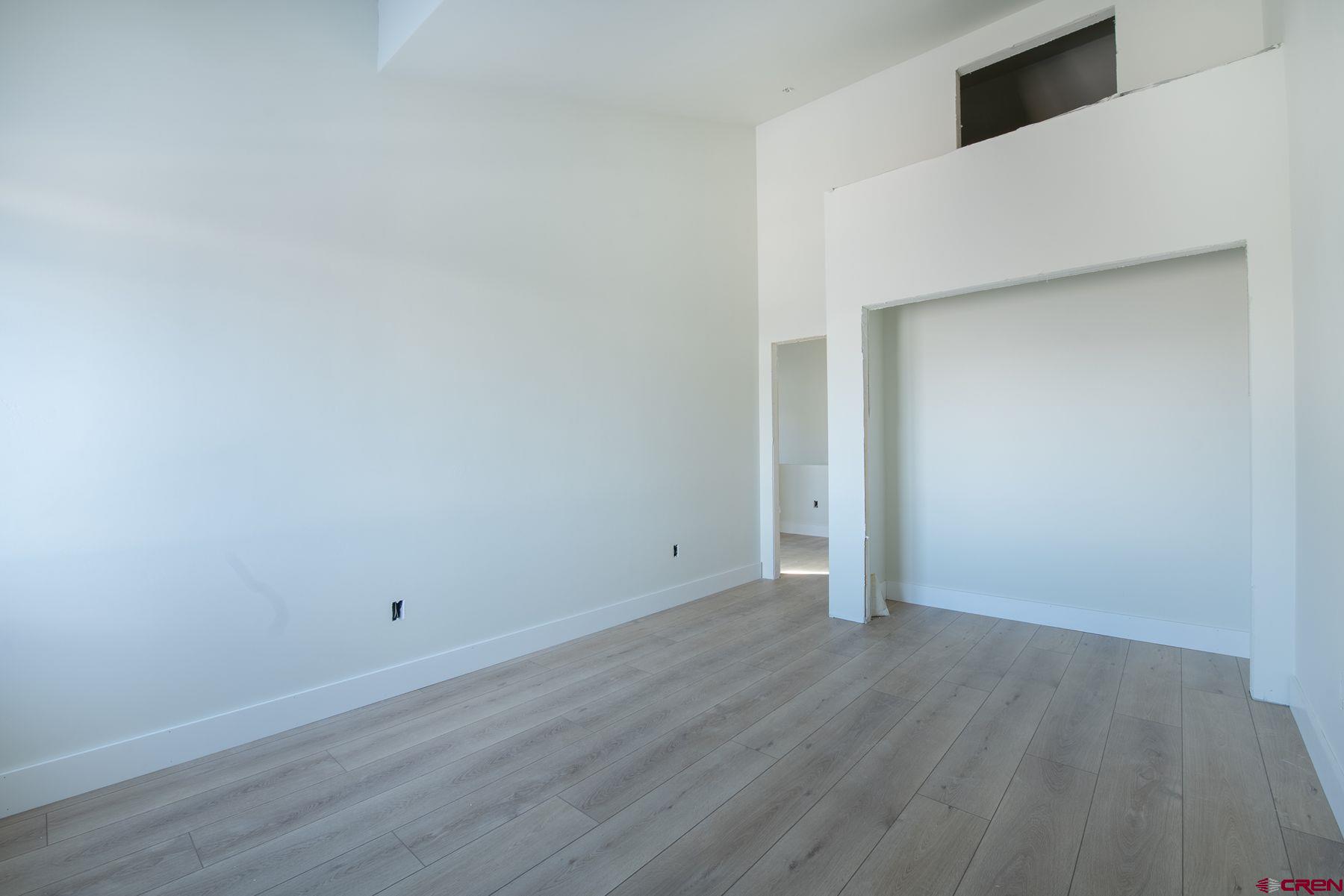 40 Elk Valley Road Crested Butte, CO 81224 - Photo 12 of 25 an empty room with wooden floor