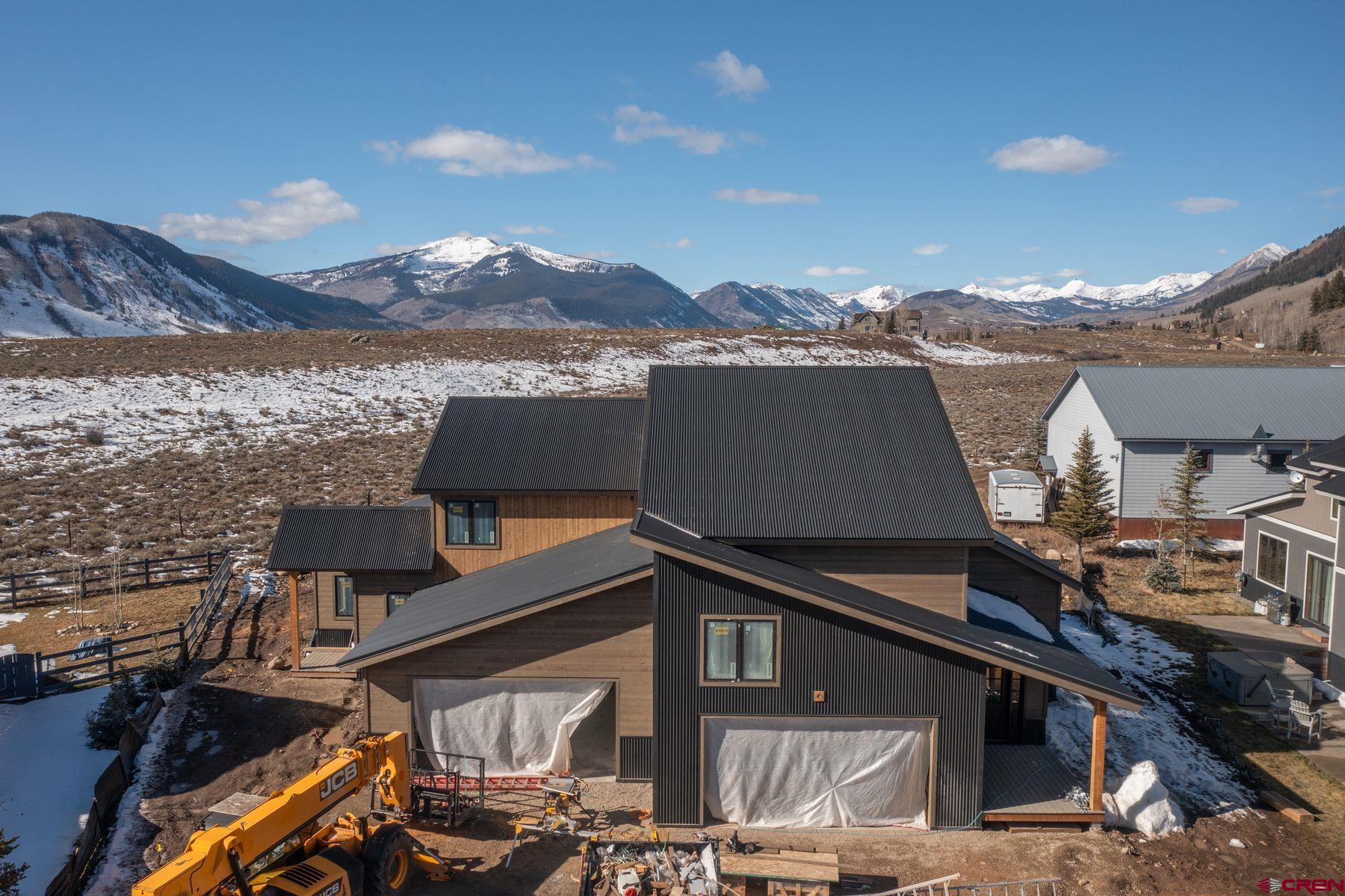 40 Elk Valley Road Crested Butte, CO 81224 - Photo 18 of 25 a view of a house with a yard