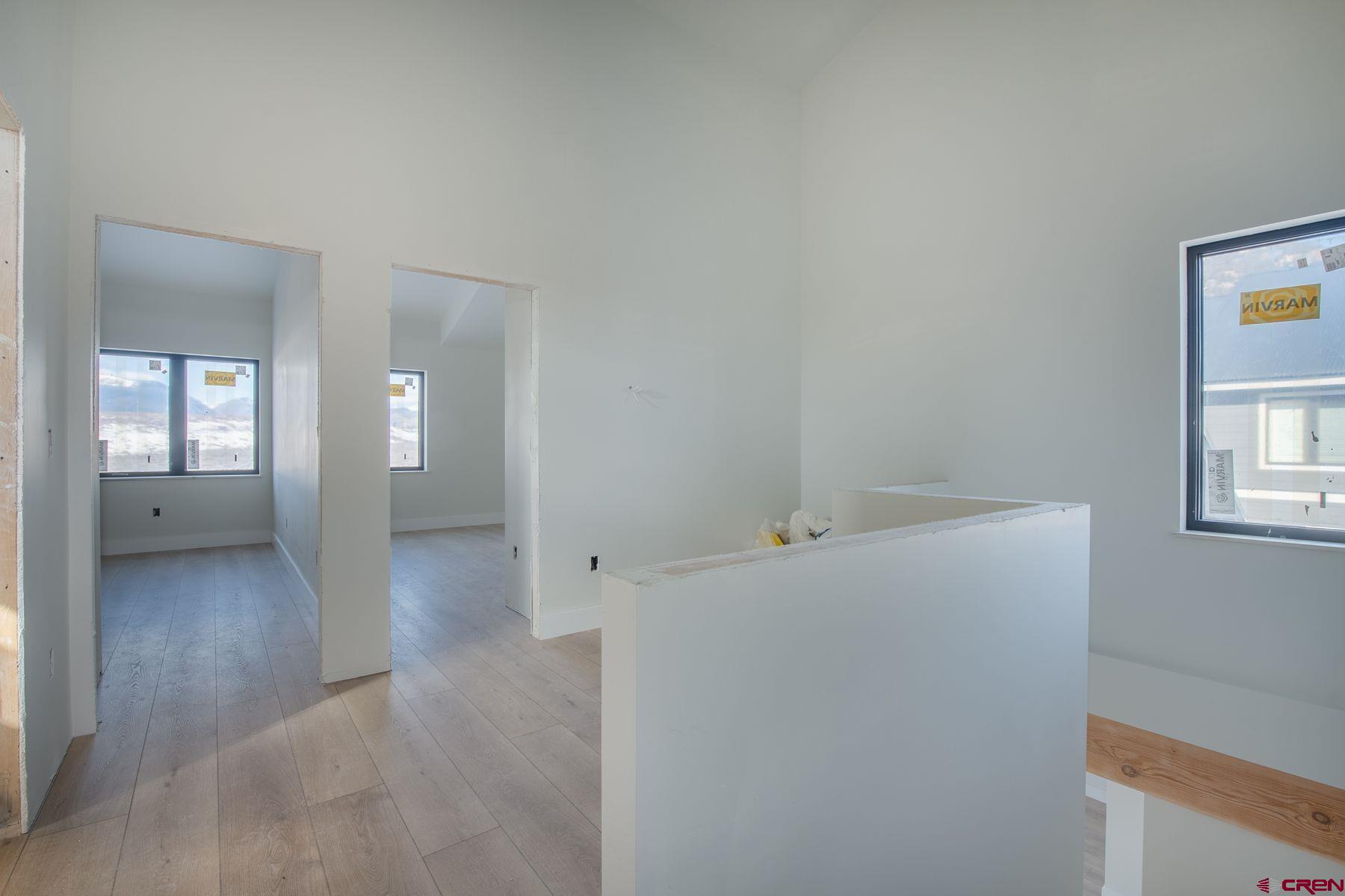 40 Elk Valley Road Crested Butte, CO 81224 - Photo 8 of 25 wooden floor in an empty room