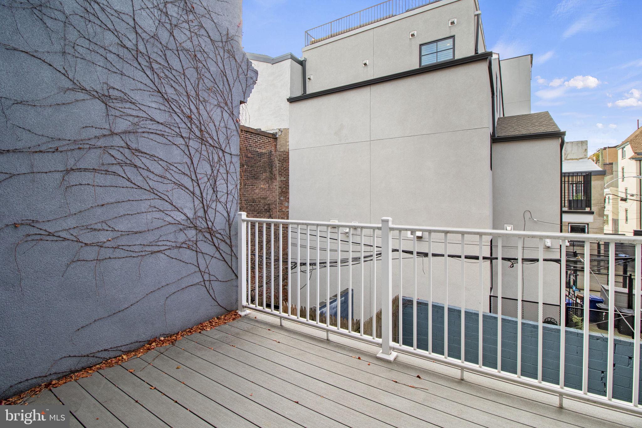 418 South 15th Street, Unit 2R Philadelphia, PA 19146 - Photo 17 of 26 a view of a wooden deck