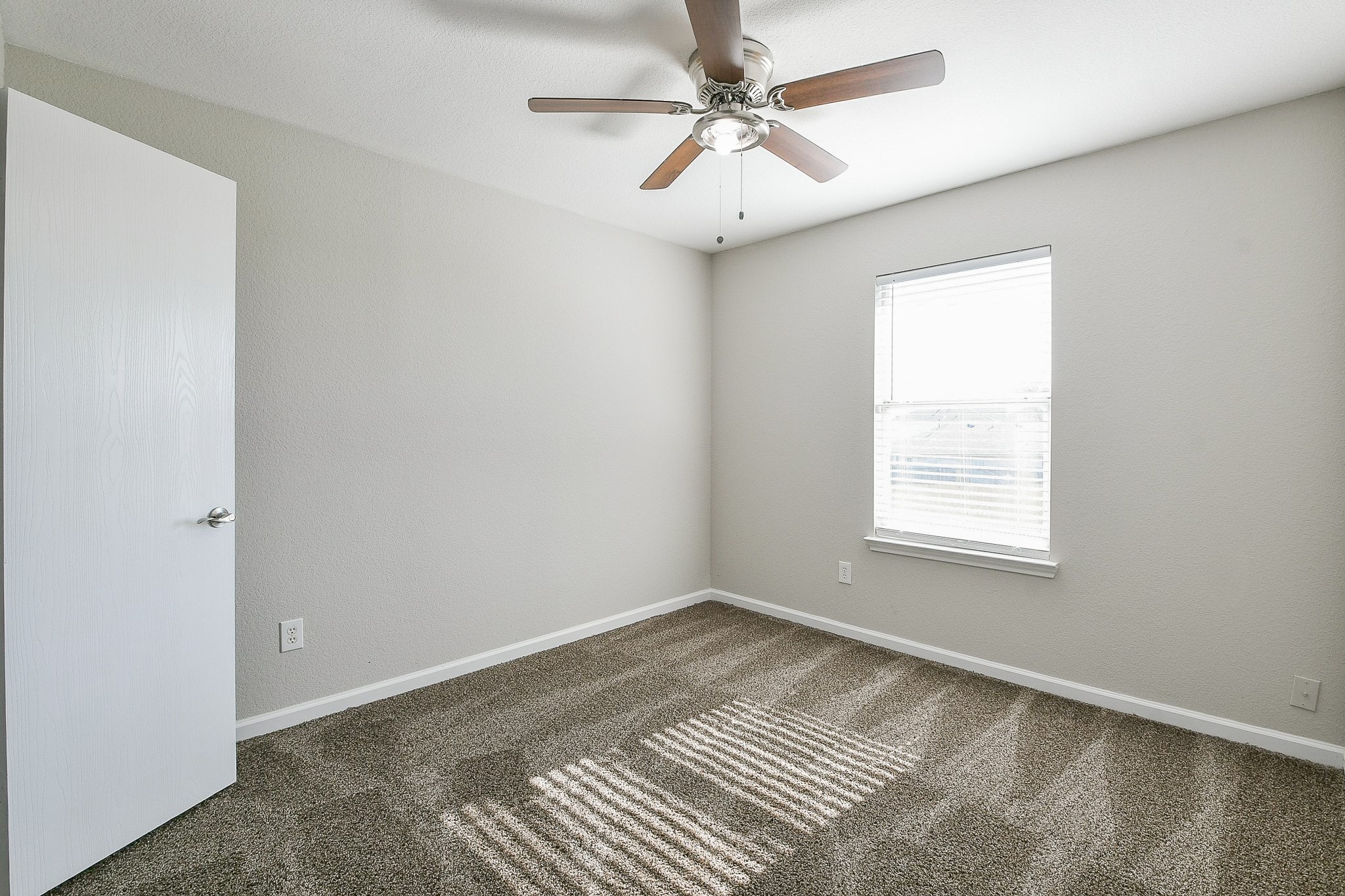 20807 Lansing Ridge Lane Katy, TX 77449 - Photo 17 of 35 a view of an empty room with a window