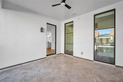 a hallway with sink and mirror