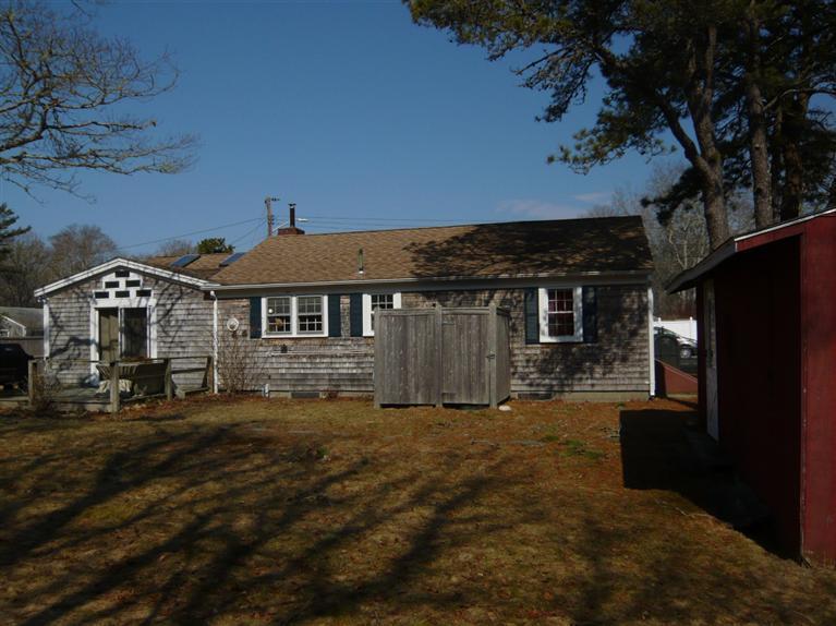 13 Shannon Road Harwich, MA 02645 - Photo 14 of 18 a view of a house with a yard