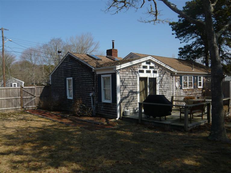 13 Shannon Road Harwich, MA 02645 - Photo 15 of 18 a front view of a house with garden