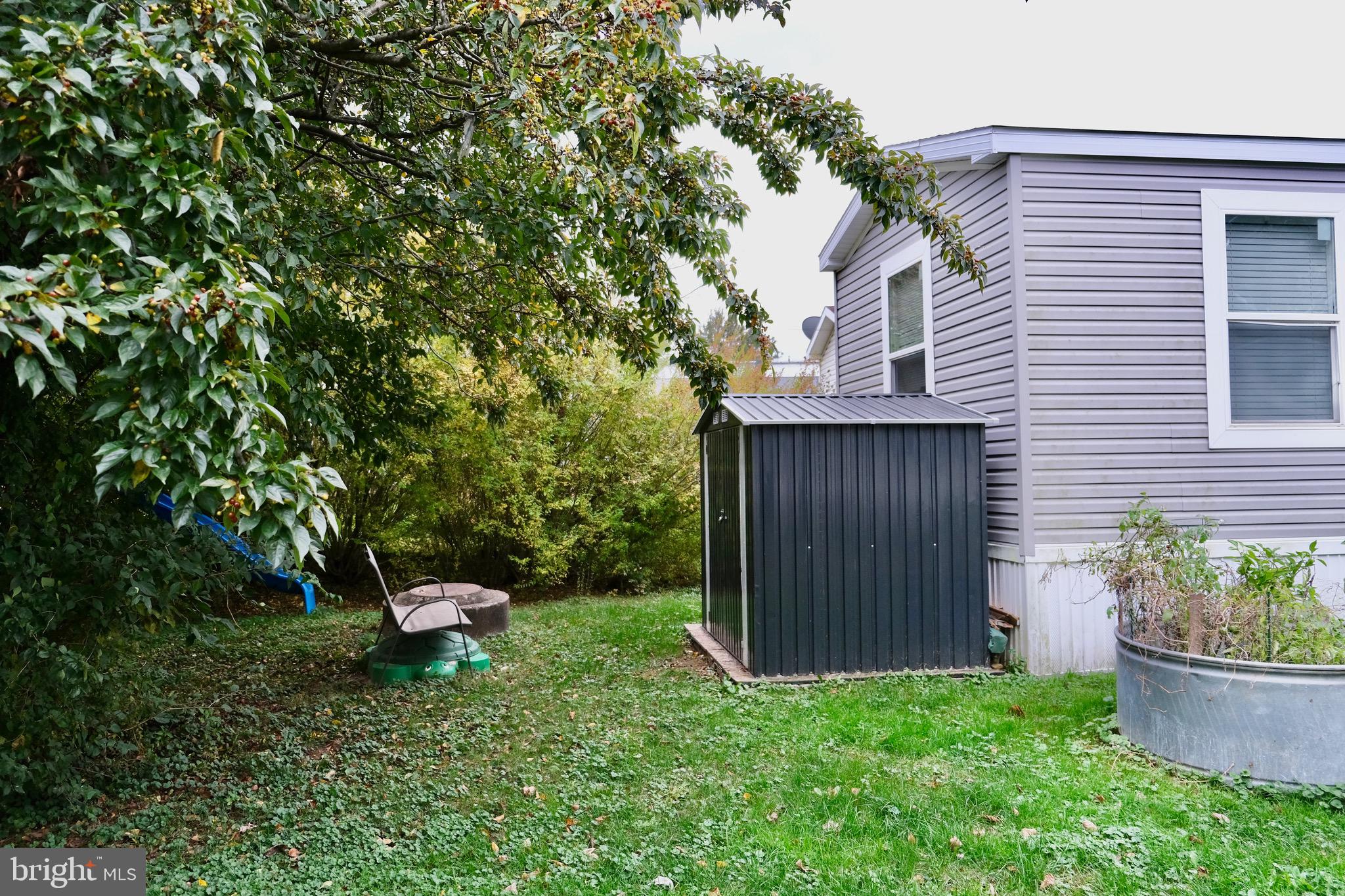 30 Keystone Road Reading, PA 19606 - Photo 3 of 9 a view of backyard with outdoor seating and green space