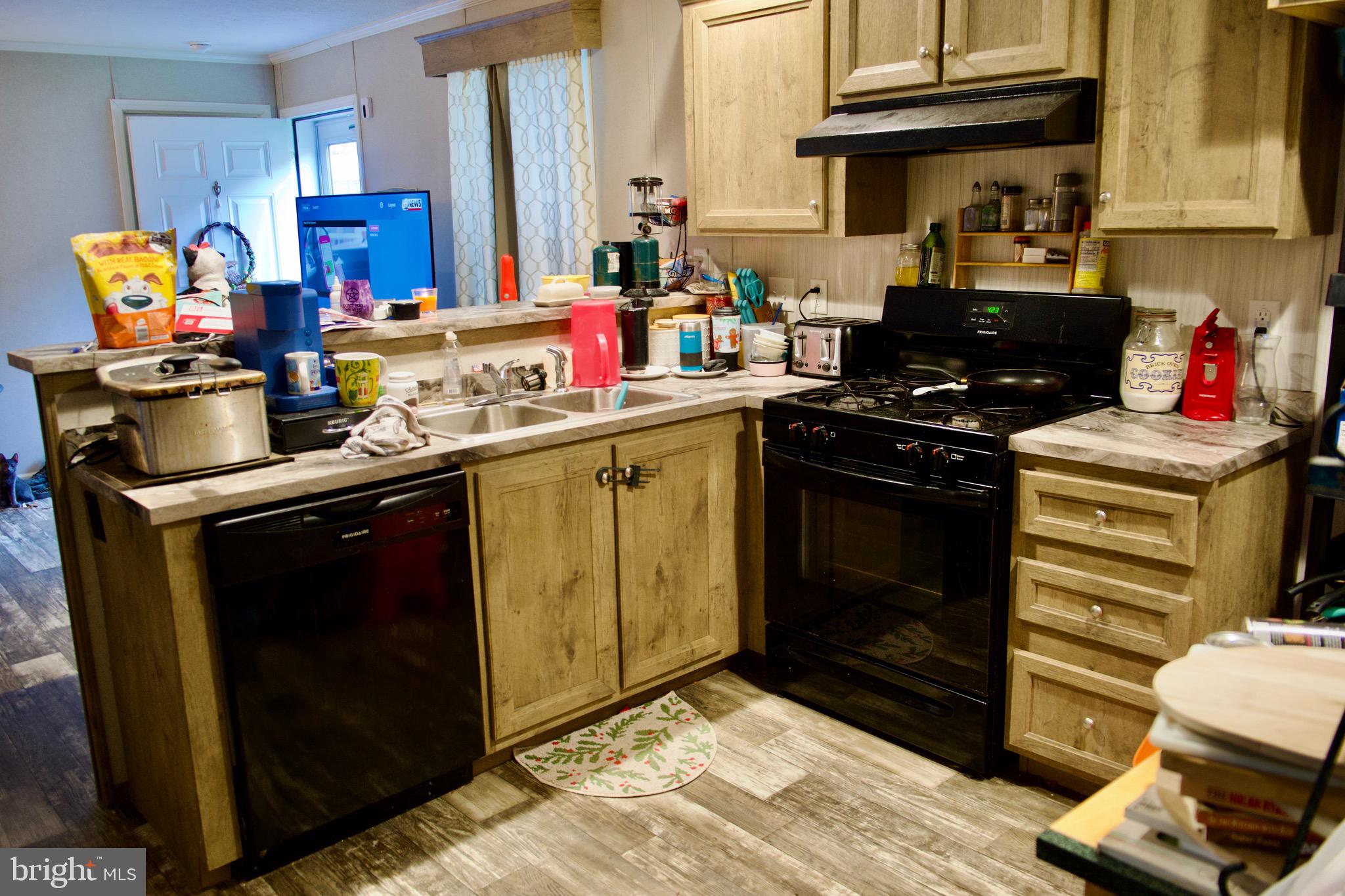 30 Keystone Road Reading, PA 19606 - Photo 5 of 9 a kitchen with a sink stove and cabinets