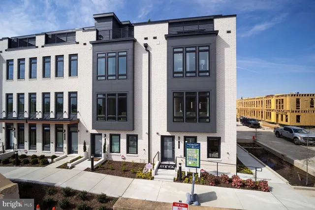 a front view of a building with street view