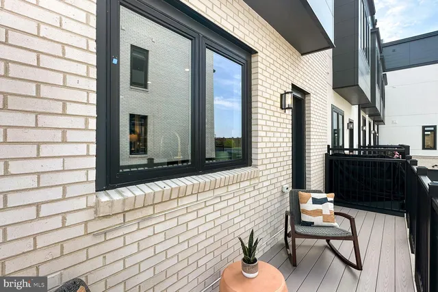 a front view of a building with street view