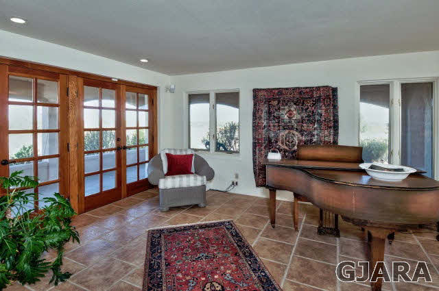 3412 D Road Palisade, CO 81526 - Photo 6 of 9 a living room with furniture and a window