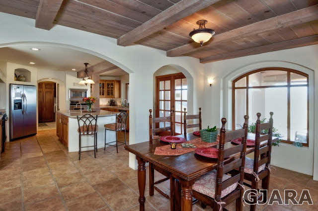 3412 D Road Palisade, CO 81526 - Photo 7 of 9 a view of a dining room with furniture and chandelier
