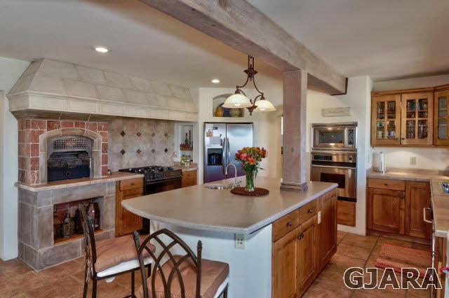 3412 D Road Palisade, CO 81526 - Photo 9 of 9 a kitchen with a dining table and chairs