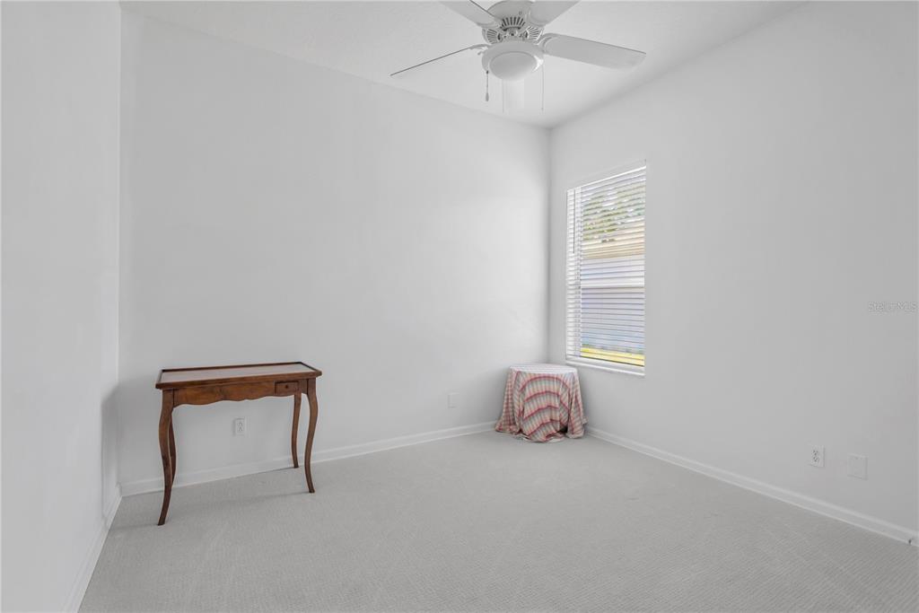 19015 Fern Meadow Loop Lutz, FL 33558 - Photo 26 of 50 an empty room with a window
