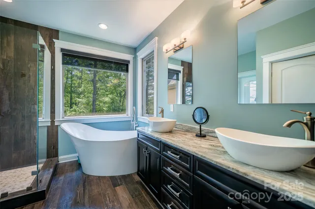 a bathroom with a bathtub and a sink