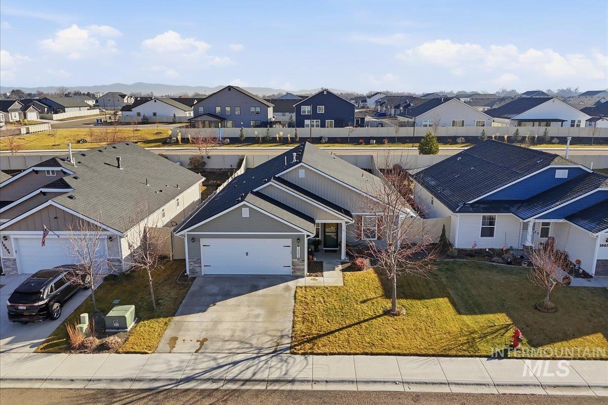 16682 Loggia Avenue Caldwell, ID 83607 - Photo 6 of 46 Aerial perspective of suburban area